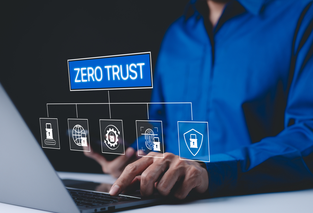 Shield icon over a laptop representing trusted software